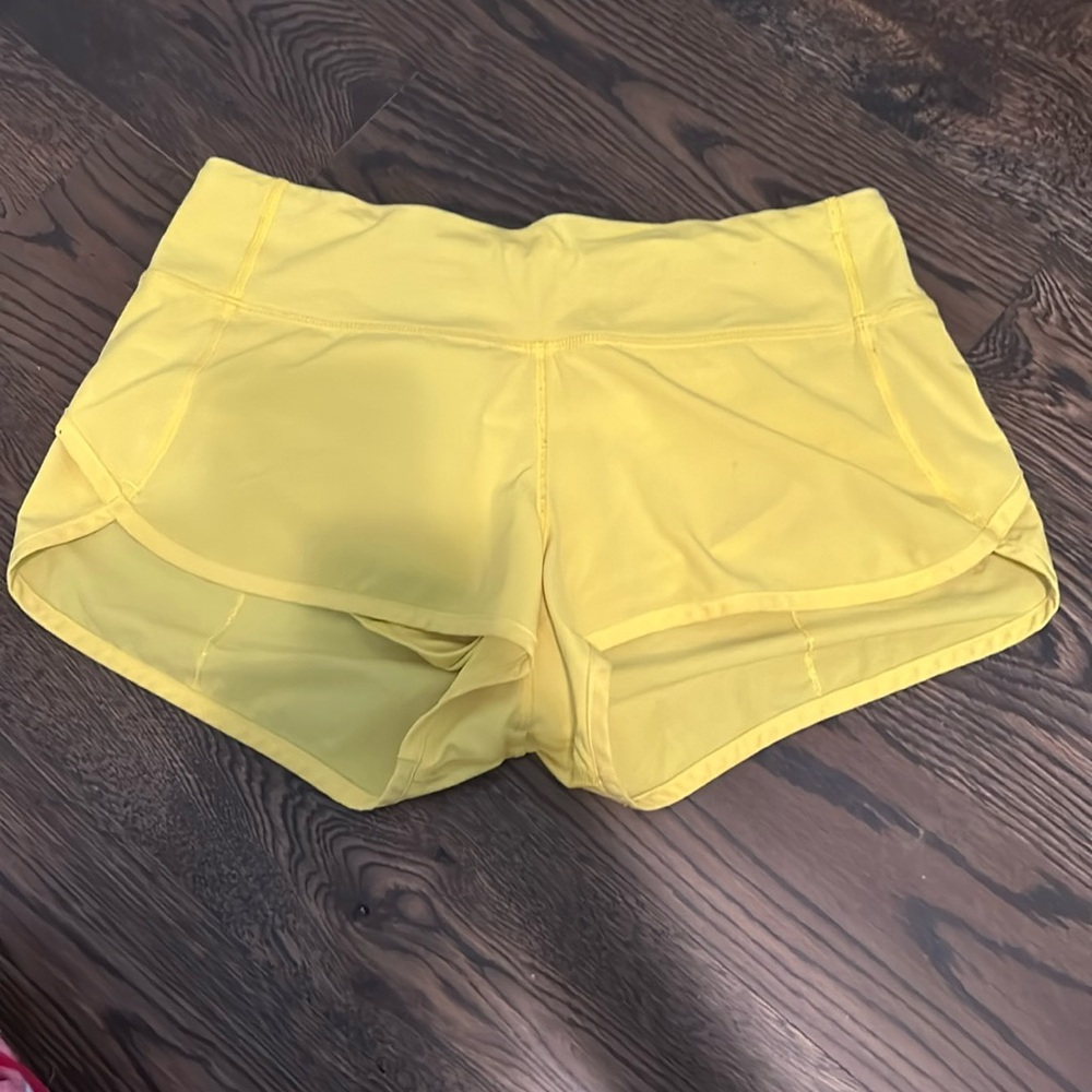 2.5” very cute yellow lululemon speed ups! discontinued!!